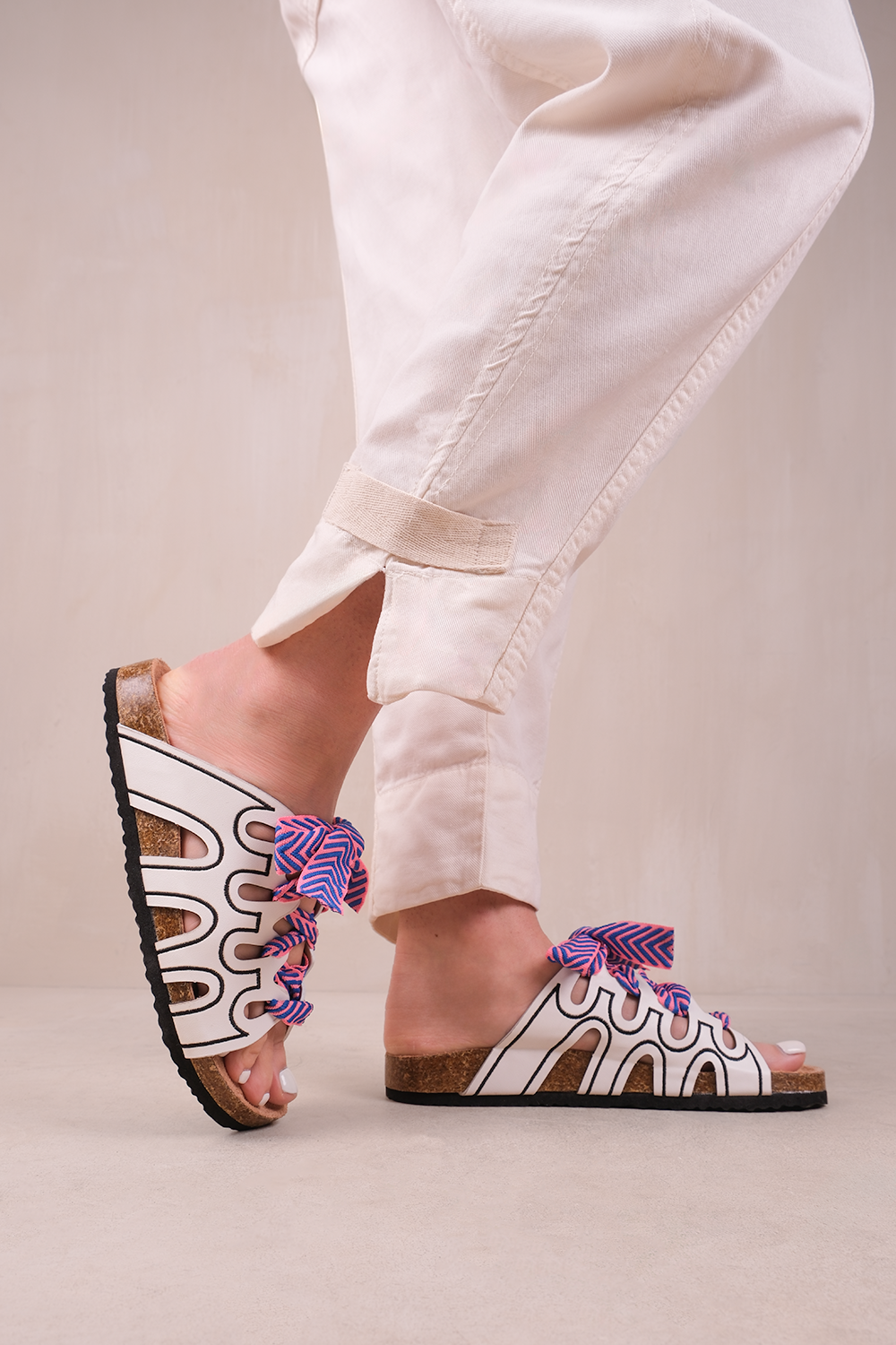 PARADOX STRAPPY FLAT SANDALS WITH PRINTED RIBBON DETAILING IN WHITE FAUX LEATHER