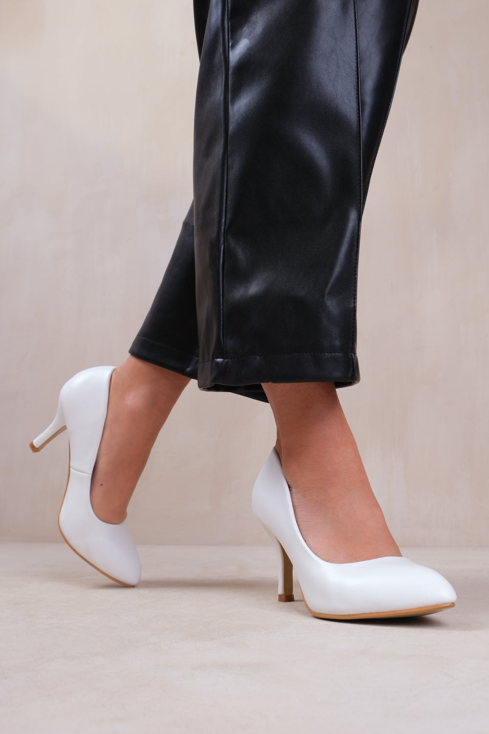 White court clearance shoes mid heel