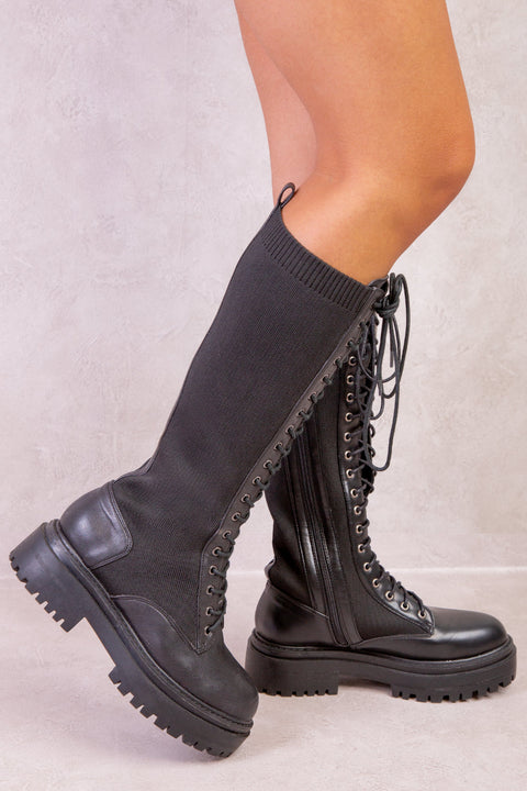 DYANNA KNITTED PANEL LACE UP CALF BOOTS IN BLACK FAUX LEATHER