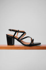 SIDRA WIDE FIT MID HIGH BLOCK HEEL SANDALS WITH CROSS OVER STRAP IN BLACK FAUX LEATHER