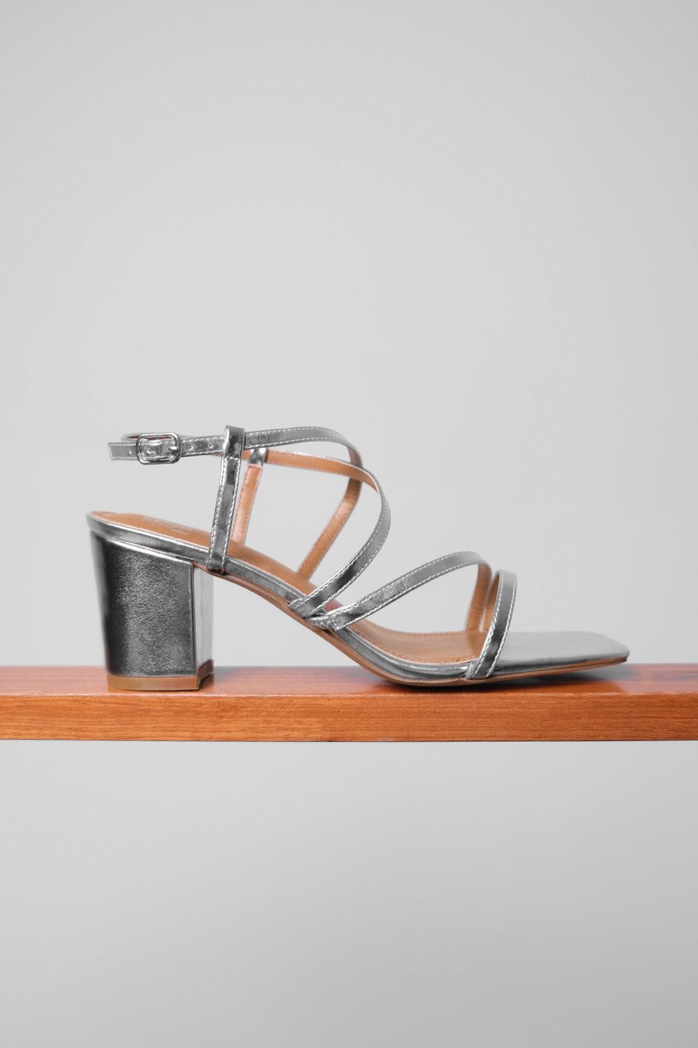 SIDRA WIDE FIT MID HIGH BLOCK HEEL SANDALS WITH CROSS OVER STRAP IN SILVER METALLIC FAUX LEATHER